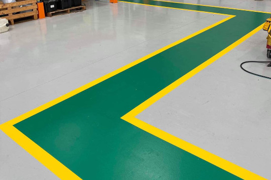 Line Marking by main green color highlighted by yellow on the edges has been done professionally by Complete Coatings Company